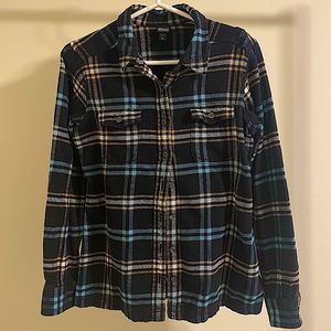 Woman’s long sleeved organic cotton flannel button down shirt